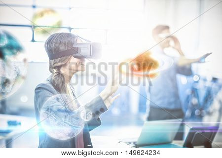 Digital image of earth against woman using virtual reality simulator