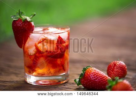 Fresh Made Strawberry Caipirinha On Wooden Background