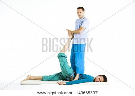 Massage parlor. Various techniques of Thai massage