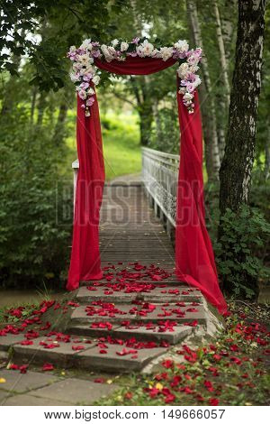 wedding decor flower arch of red color