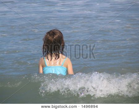 Jovem no Oceano