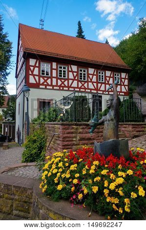 Residential tudor style house with blue sky in background. Castle Neuenbuerg in Germany.