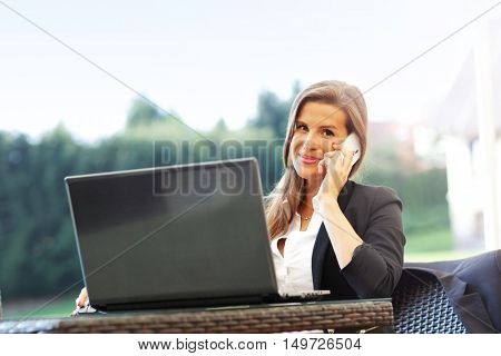 Picture of young manager working cafe