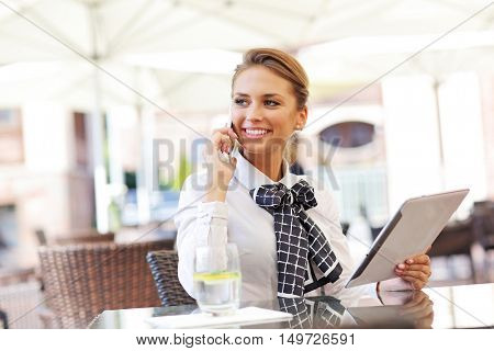 Picture of young manager working cafe