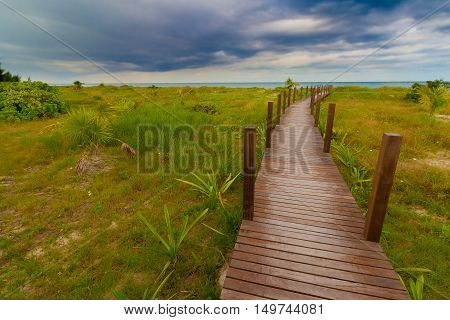 Bridge to the beach on Cayo Levisa