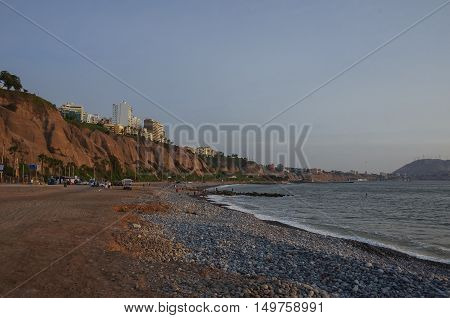 View Of Lima Coastline And City Beach At Sunset In Miraflores District, Lima, Peru