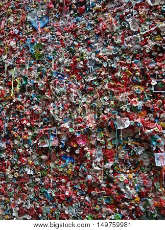 SEATTLE- JUNE 24 : Close-up of The Market Theater Gum Wall in downtown Seattle on June 24 2016. It is a local landmark in downtown Seattle in Post Alley under Pike Place Market.