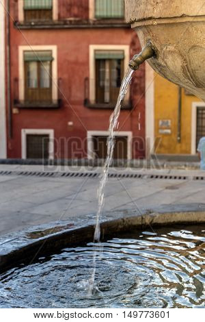 Typical source placed in the square of the cathedral of San Julian in Cuenca Spain