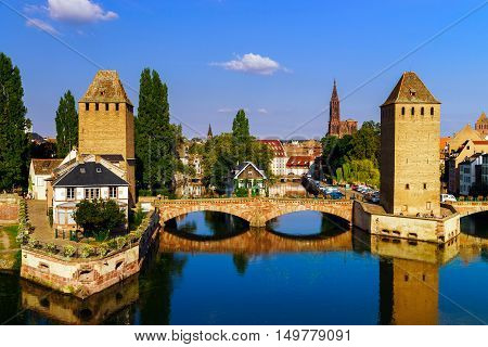 Old Historical Center Of Strasbourg. Fortress Towers And Briges In Little France With Reflection In