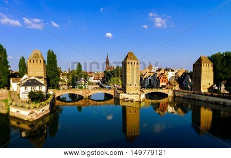 Old Historical Center Of Strasbourg. Fortress Towers And Briges In Little France With Reflection In