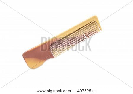 It is Brown plastic comb isolated on white