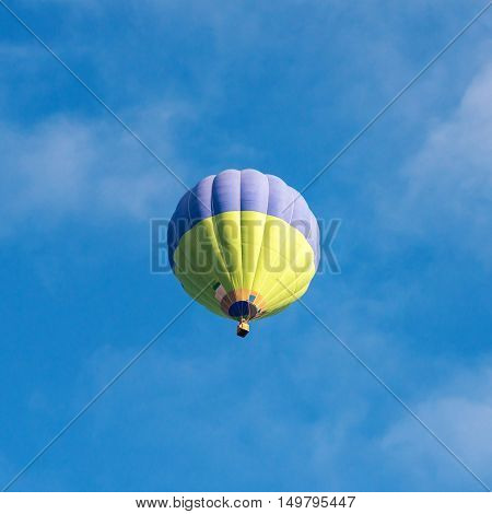 Balloon silhouette in the sunrise sky. Cappadocia, Turkey