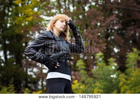 Nice Girl With Arms In Autumn Day