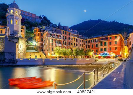 The old main square on the waterfront in the Italian village of Vernazza at night. Parco Nazionale delle Cinque Terre, Liguria, Italy.