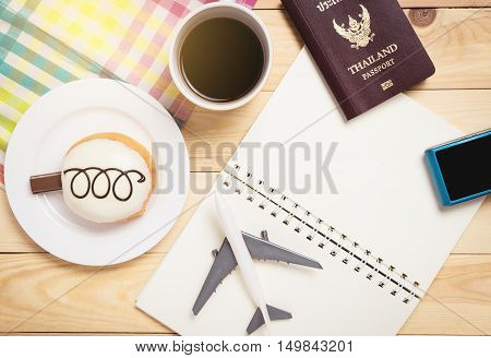 Air travel planner traveler object in cafe table