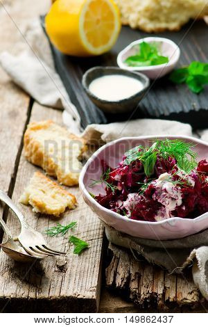 Beet salad with tahina sauce .selective focus