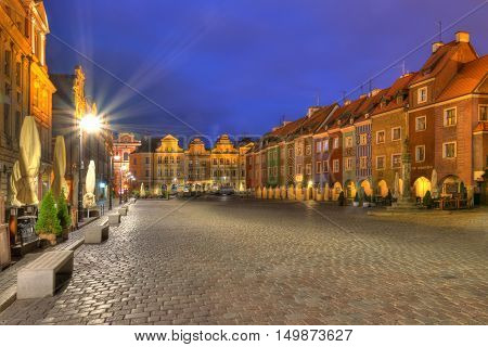 Poznan Poland - September 30 2016: Night photo of Poznan Old Market in Poznan with colorful illuminated townhouses so called 