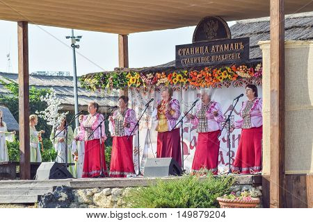 Folk Singer At A Concert In The Cossack Village Of Ataman. Folk Songs.
