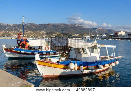 Traditional Greek fishing boats near pier of Sitia town on Crete island