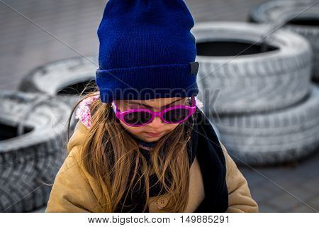beautiful stylish little girl with glasses emotion girl