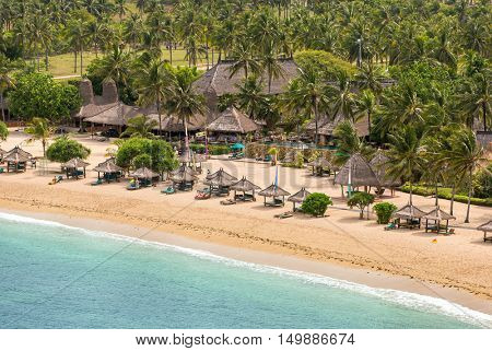 Tropical resort on Kuta sand beach, Lombok, Indonesia