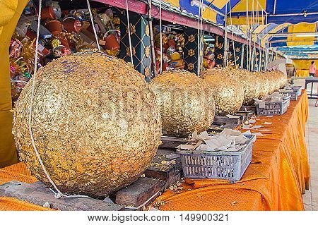 Loknimit (golden Sphere) Sacred Marker Spheres. Gold Foil On Loknimit In Thai Temple