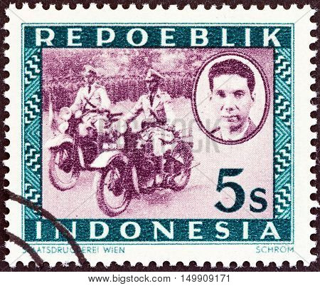 INDONESIA - CIRCA 1947: A stamp printed in Indonesia shows Motorized police, Ali Sastroamidjojo (1903-1976), circa 1947.