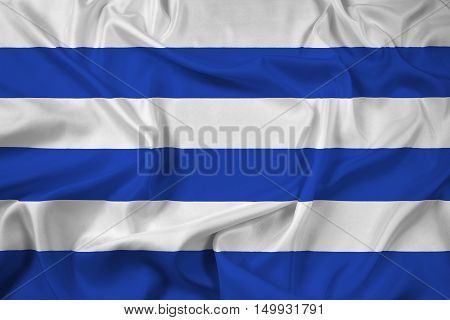 Waving Flag of Dunkirk France, with beautiful satin background. 3D illustration