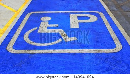 Handicapped parking symbol on floor background. idea.