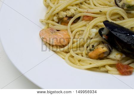 An italian recipe with pasta and seafood