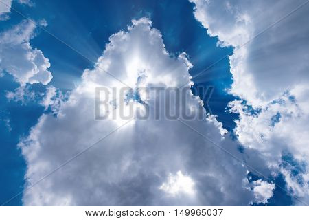 Sunbeam through the haze on blue sky