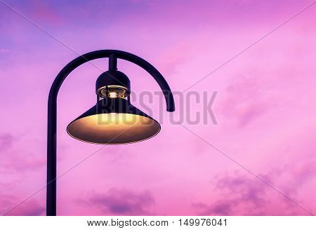 Lamp Post at Twilight.To illuminate the area outside the building.