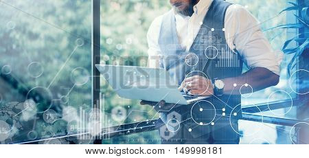Concept Global Strategy Graph Virtual Icon Diagram.Innovations Searching Interface.Bearded Businessman Wearing Glasses White Shirt Waistcoat Typing Mail Modern Laptop His Hand.Blurred Background.Wide