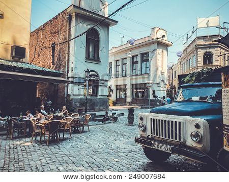 Tbilisi, Georgia - July 10, 2018: Old Town Street, Cafe In Shardeni Street. Front Of The Old Cargo C