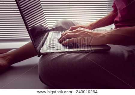 Girl Holds An Open Macbook Pro Retina With Usb Type-c On Her Lap And Something Prints - June 28, 201