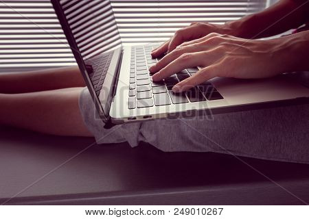 Girl Holds An Open Macbook Pro Retina With Usb Type-c On Her Lap And Something Prints - June 28, 201