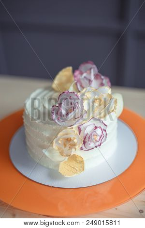 White Sponge Cake On Wooden Bright Table