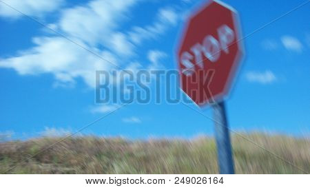 Ironic Stop Signal In Movement. Do Not Stop