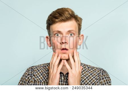 Omg Unbelievable Shock Amazement. Dumbfounded Man With Open Mouth. Portrait Of A Young Guy On Light 