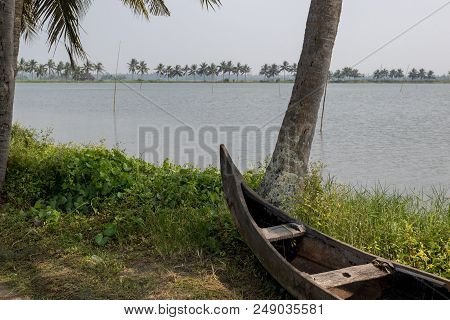 Landscape View Of Wetland Area With Traditional Canoe,  In Kochi, Kerela, India