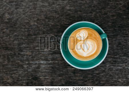 Beautifiul Cup Of Hot Cappuccino On The Wood Background. Two Hearts Shape Latte Art. Top View, Flat 