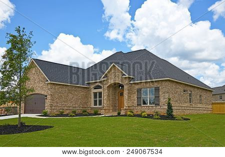 A New Brick House In A Subdivision For Sale