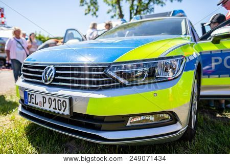 Delmenhorst / Germany - May 6,2018: German Police Car, Volkswagen Passat Stands On An Open Day. Poli