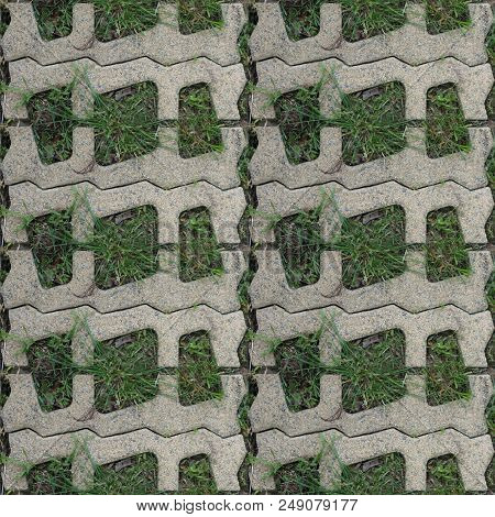 Seamles Pattern Of Concrete Road Tile On The Green Grass Path