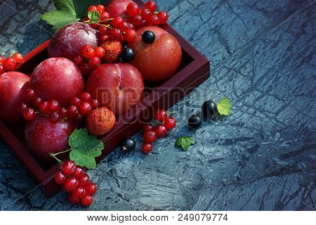 Bright Still Life With Red Berries On A Blue-green Marble Background, Copy Space For Your Text.