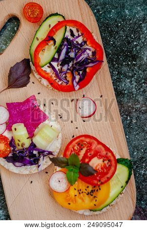 Open Sandwiches Of Rice Cakes With Cream Cheese , Vegetables, Healthy Breakfast