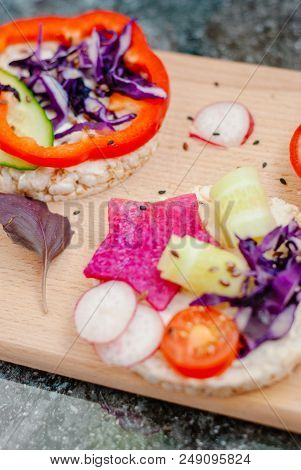 Open Sandwiches Of Rice Cakes With Cream Cheese , Vegetables, Healthy Breakfast