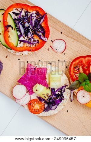 Open Sandwiches Of Rice Cakes With Cream Cheese , Vegetables, Healthy Breakfast
