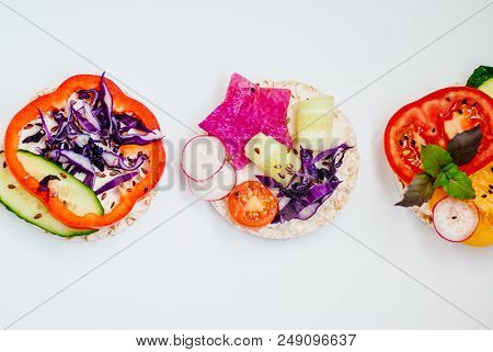 Open Sandwiches Of Rice Cakes With Cream Cheese , Vegetables, Healthy Breakfast