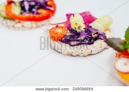 Open Sandwiches Of Rice Cakes With Cream Cheese , Vegetables, Healthy Breakfast